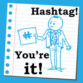 Businessman holding hashtag sign